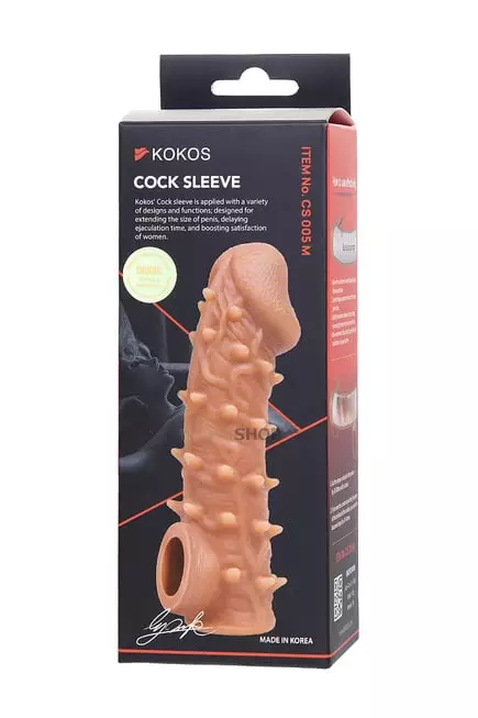 Насадка Kokos Cock Sleeve M с подхватом мошонки и с крупными шипиками, телесная